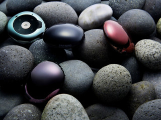 Rocks headphones earbuds group top - top of them free wallpaper