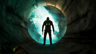 Man tunnel gun flashlight standing - his hand and a flashlight free wallpaper