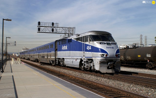 Blue train loading platform station - track next free wallpaper