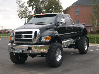 Black truck parking lot house - a house and trees free wallpaper