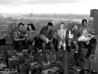 People sitting building city view - top of a building free wallpaper