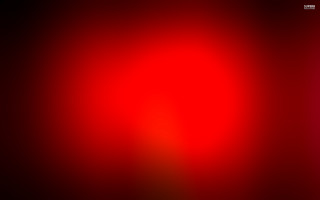 Red black background red light - a red light in the middle of it free wallpaper