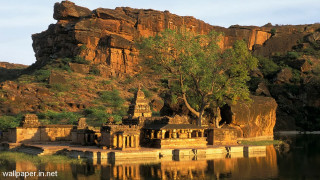 Lake rock formation tree mountain - a mountain in the background free wallpaper