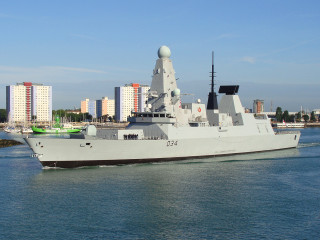 Military ship sailing water city - daphne allen free wallpaper