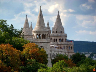 Castle spires trees cloudy sky - medieval free wallpaper for desktop