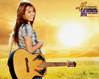 Girl holding guitar field grass - a girl holding free wallpaper for desktop