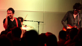 Man stage guitar band member - a guitar in front free wallpaper