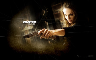 Woman holding gun wanted sign - a woman holding free wallpaper for desktop