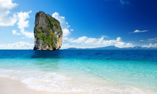 Rock ocean beach clear blue - clear blue water free wallpaper