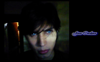 Man blue eyes cell phone - dark shadow free wallpaper