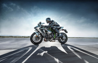 Man motorcycle road cloudy sky - a shadow of a person free wallpaper