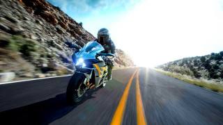 Motorcycle ride mountain road sky - a person riding free wallpaper
