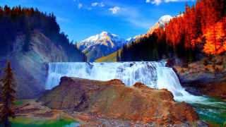 Waterfall mountain trees foreground nature - a mountain in the background and trees free wallpaper