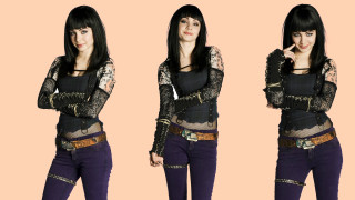 Woman black top purple pants 2 - her right hand free wallpaper for desktop