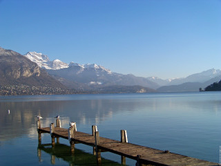 Pier birds water mountains lake - a mountain range in the background free wallpaper for desktop