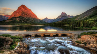 Bridge waterfall river mountains sunset - a waterfall in the middle of it free wallpaper