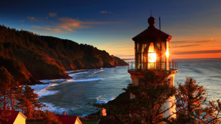 Lighthouse cliff ocean sunset bright - radiant light free wallpaper