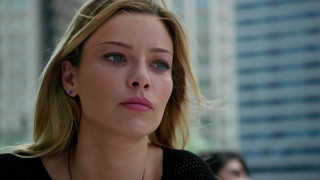 Woman blue eyes city skyscrapers - eve ryder free wallpaper