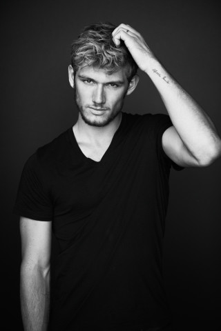 Man tattoo arm black shirt - free portrait wallpaper