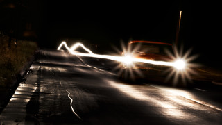 Car night street headlights shining - a street light free wallpaper