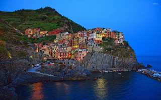 Small village cliff water night - a small village free wallpaper
