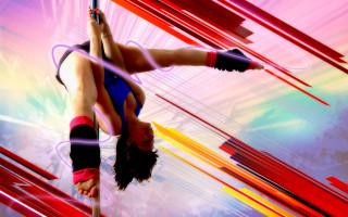 Woman handstand pole colorful background - a colorful background free wallpaper