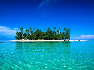 Small island palm trees blue 2 - a boat in the distance free wallpaper