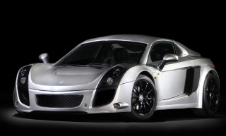 White sports car dark room 2 - a white sports car free wallpaper for desktop
