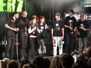 Group people stage microphones black - their hand and a man free wallpaper