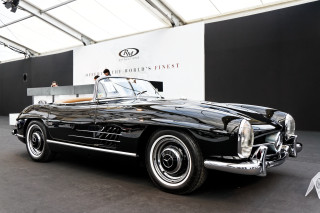 Black car showroom man woman - a showroom free wallpaper