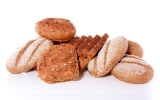 Bread pastries pile white background - heavy grain free wallpaper