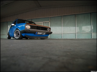 Blue truck garage building window - a garage next free wallpaper