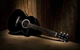 Guitar wooden table spotlight wall 2 - a wooden table free wallpaper