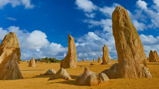 Rocks desert blue sky clouds 2 - a group of rocks free wallpaper