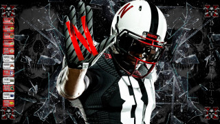 Football player glove ball space - a football player holding free wallpaper