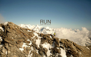 Man climbing mountain run snow - a mountain free wallpaper for desktop