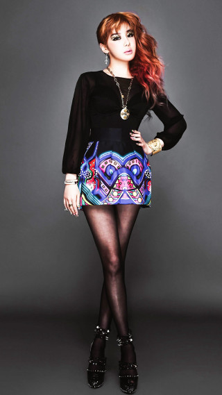 Woman black top colorful skirt 2 - contemporary fashion free wallpaper for mobile