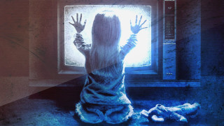 Woman sitting floor tv hands 2 - a tv free wallpaper