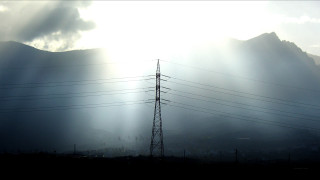 Mountain range power lines sunshine - crepuscular free wallpaper