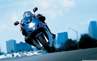 Motorcycle city skyline road tall - tall building free wallpaper