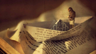 Book paper boat miniature man - in the background free wallpaper