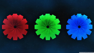Three colored umbrellas dark background - text free wallpaper