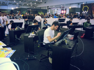 Man sitting desk laptop room - 2 d game art free wallpaper