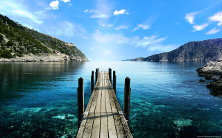 Dock mountain water background foreground - free beach wallpaper for desktop