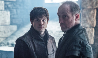 Two men stone building wall - a stone building free wallpaper