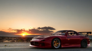 Red sports car sunset road 2 - the sun in the background free wallpaper for desktop