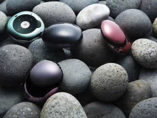 Earphones colored rocks gravel center - product photo free wallpaper