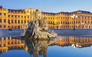 Fountain statues clocktower building foreground - a fountain free wallpaper for desktop