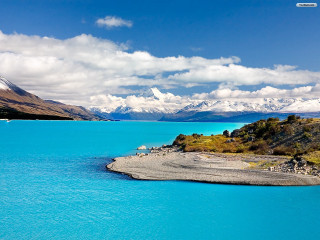Water mountains blue sky clouds - a boat free wallpaper for desktop
