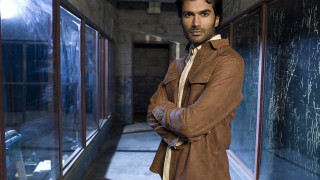 Man standing hallway arms crossed - his hip free wallpaper for desktop